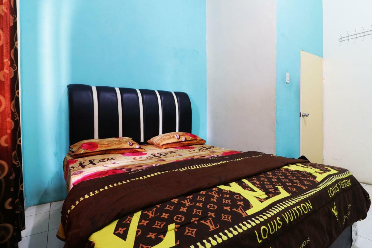 Hotel Graha Soeltan Sunggal Extérieur photo