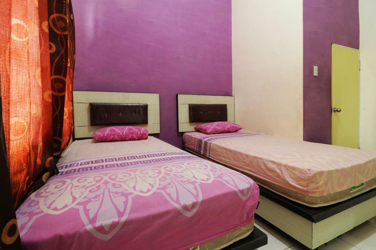 Hotel Graha Soeltan Sunggal Extérieur photo
