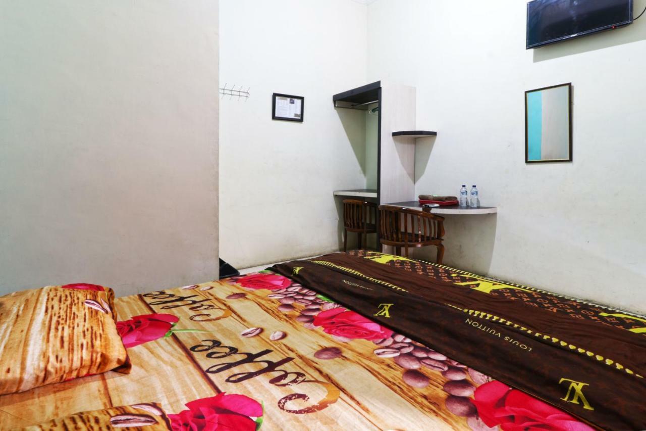 Hotel Graha Soeltan Sunggal Extérieur photo